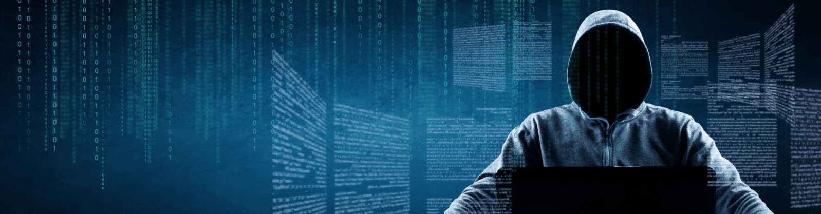 Ein Mensch in dunkler Kleidung und ohne Gesicht als Repräsentation der Gefahr der Verletzung der Informationssicherheit.